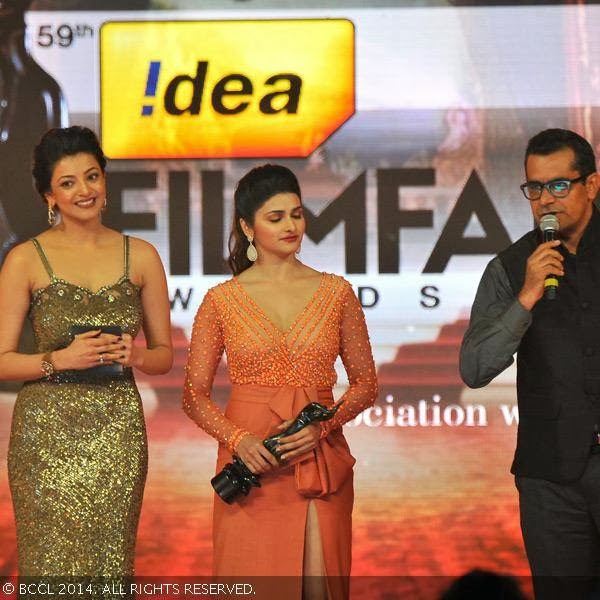 Subhash Kapoor speaks after receiving the Award for Best Dialogue Jolly LLB at the 59th Idea Filmfare Awards 2013, held at the Yash Raj Studios in Mumbai, on January 24, 2014.<br /> Kajal Agarwal and Prachi Desai presented the award to him 