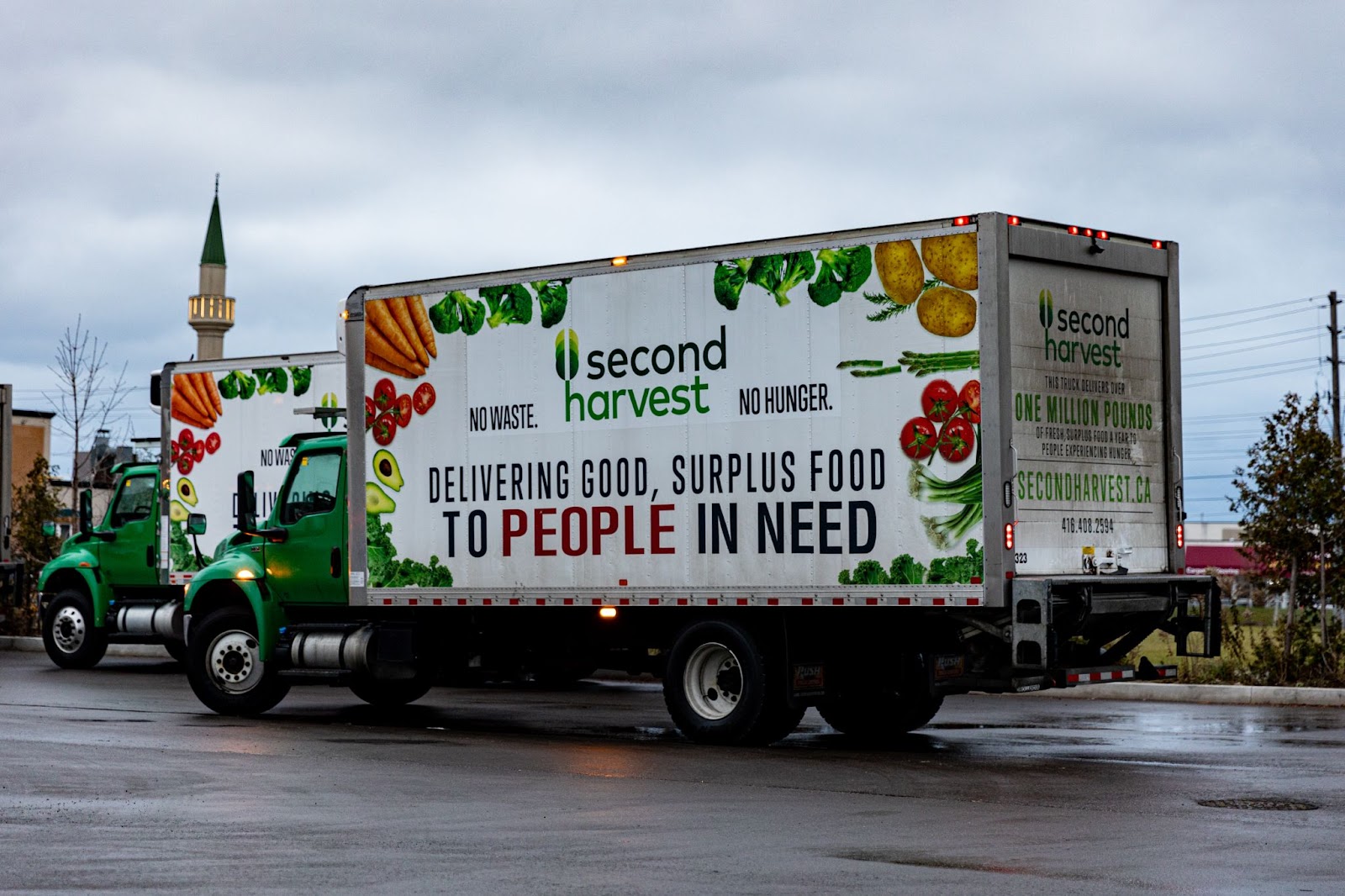 Two of Second Harvest's fleet of food rescue and redistribution trucks.