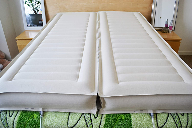An air bed with multiple bladders allows for the bed’s firmness to be set differently for different users.