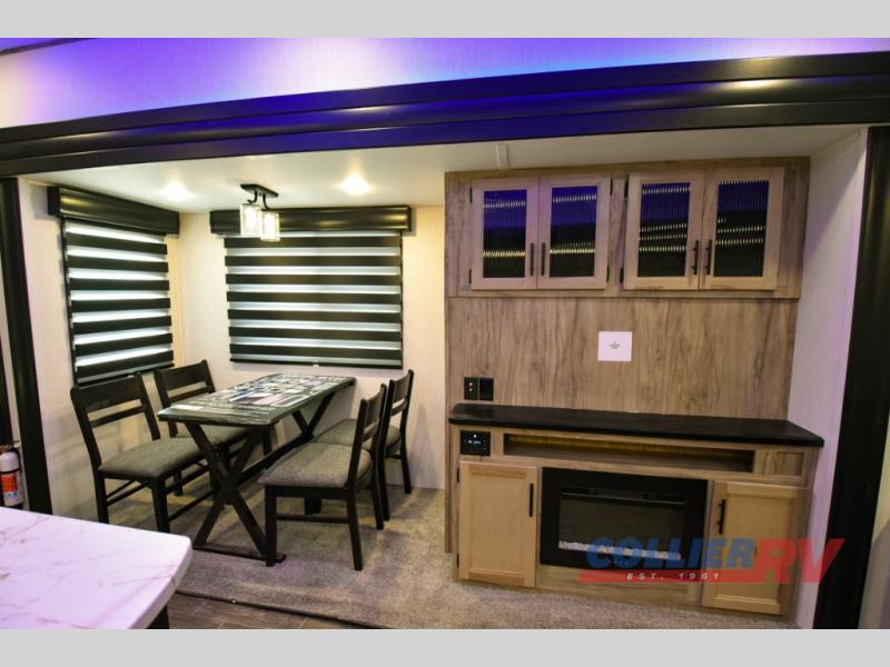 Entertainment center in the Forest River Cherokee Arctic Wolf Suite fifth wheel