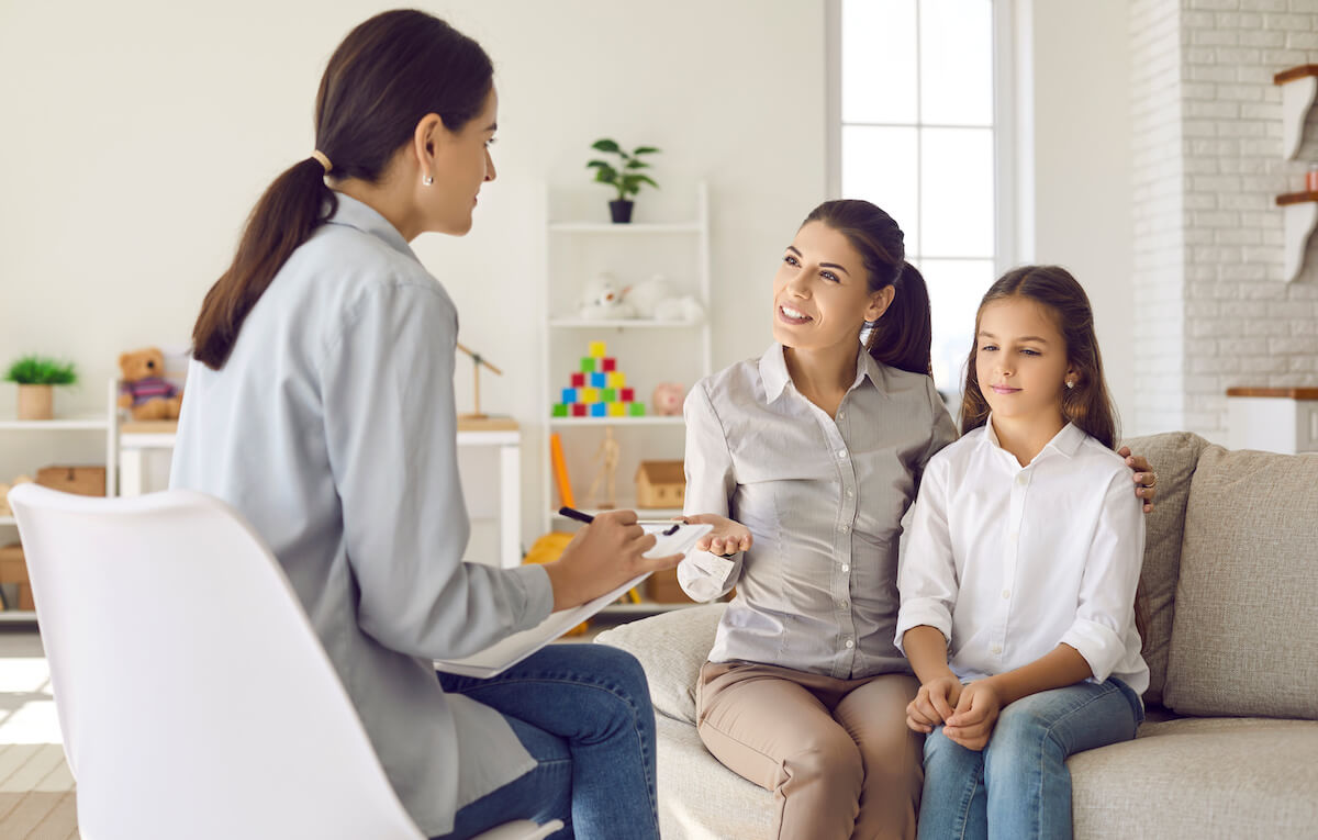 Healthcare credentialing: mother and daughter consulting a psychiatrist