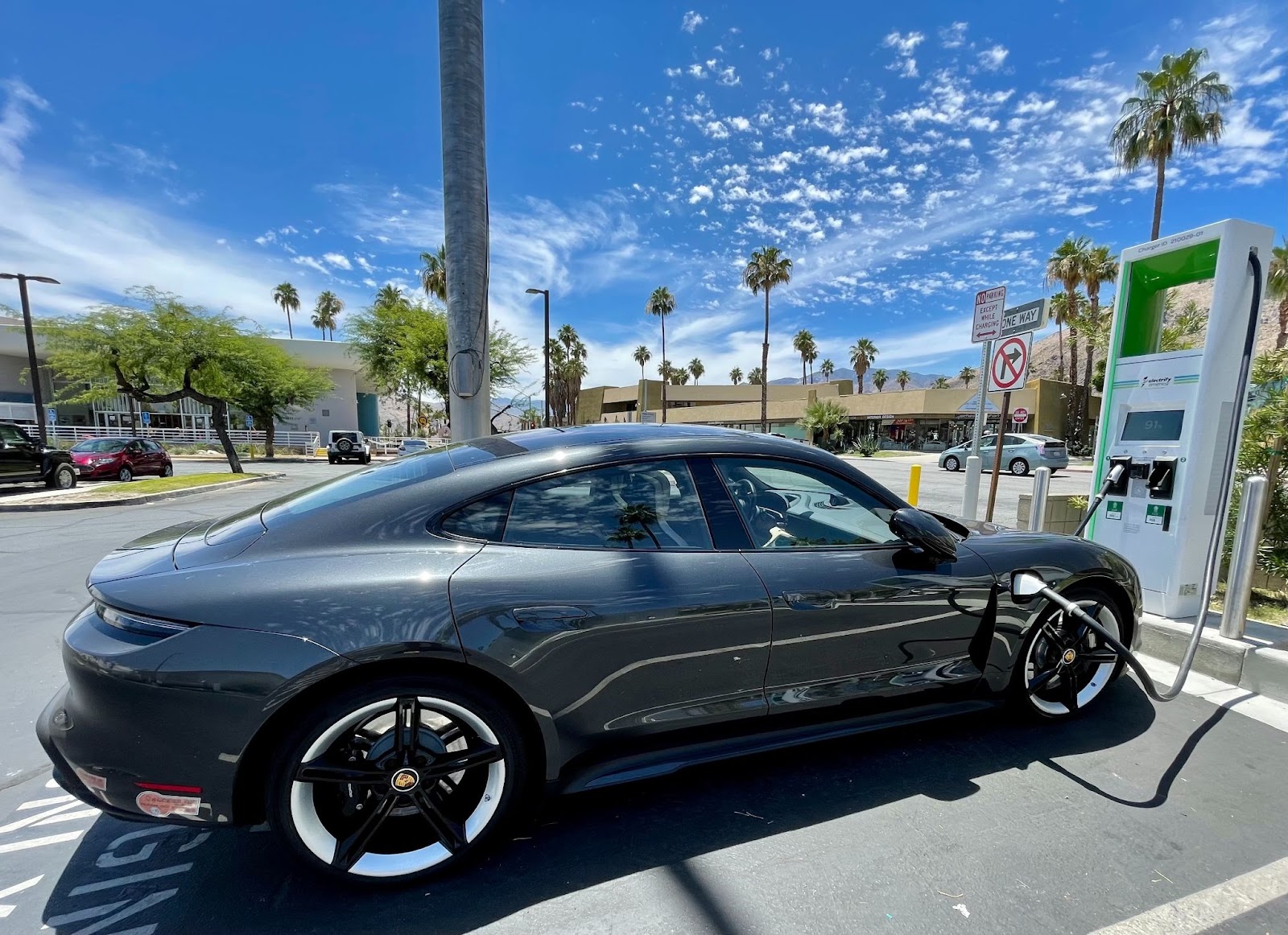 charging a Porsche all electric vehicle (EV) in palm springs, Florida