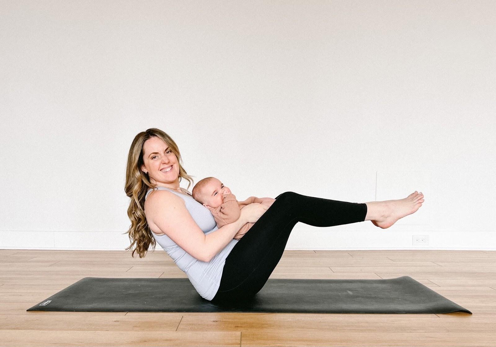 Yoga with baby - Boat pose - Kate Lombardo