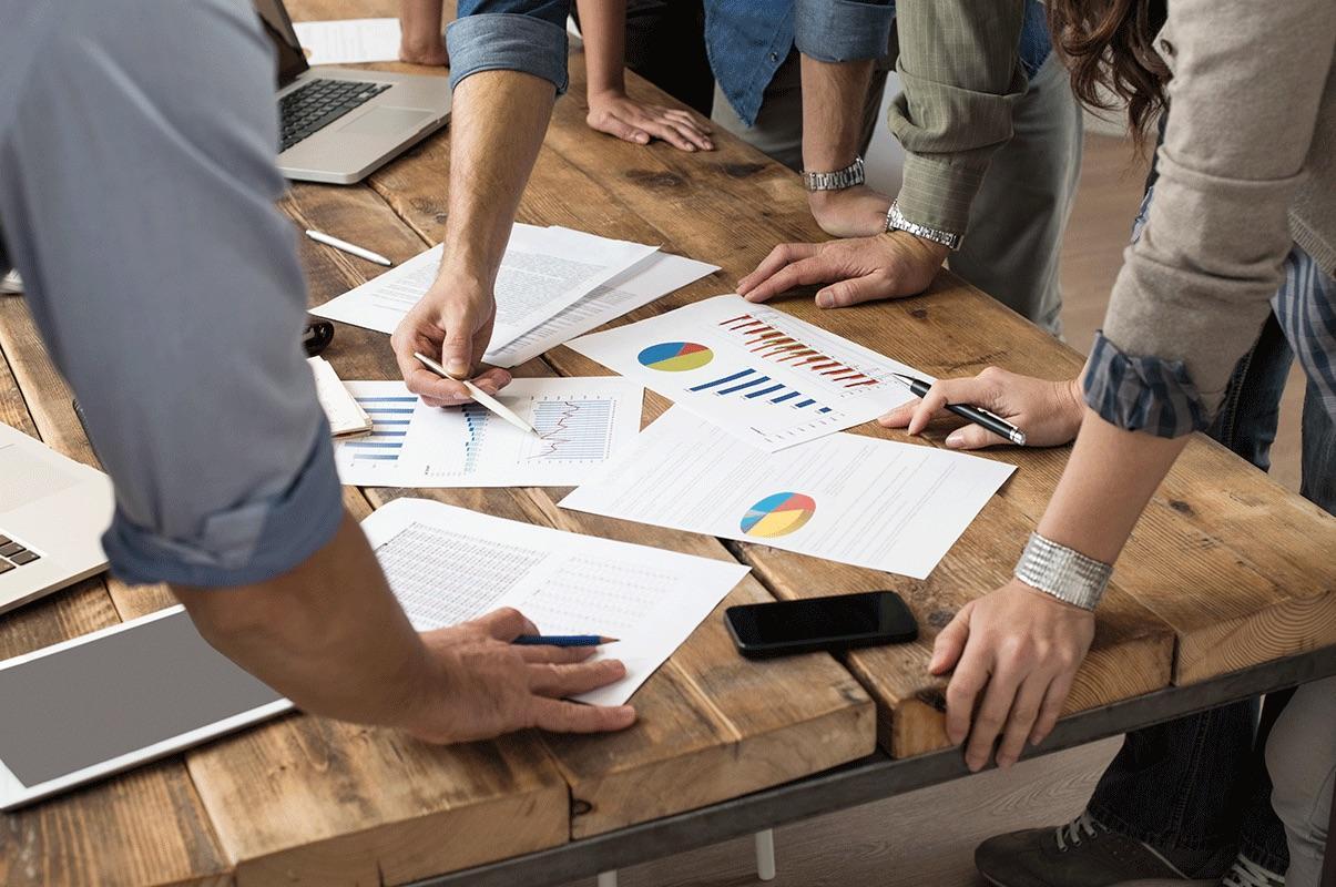 This is an image of a business meeting where they are planning a strategy.