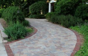 Using pavers, Greenwise created a beautiful and functional driveway for a Northshore client