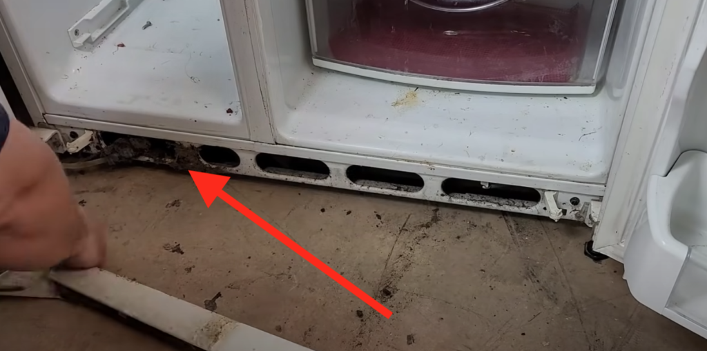 remove refrigerator kick plate and clean condenser