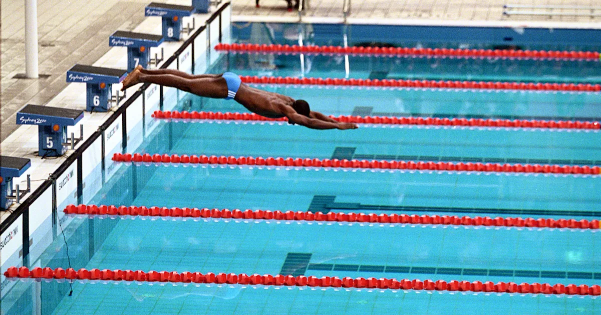 Eric Moussambi diving into the pool
