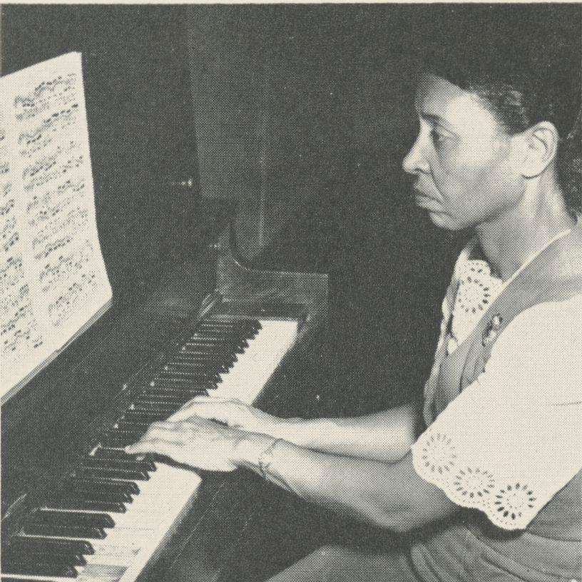 Zenobia playing piano in The Lion 1952