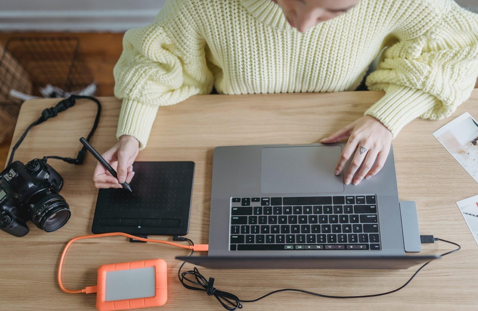 person using tablet with pen