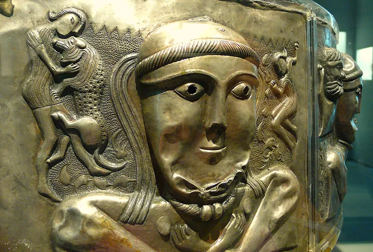A detail of the gilded silver Gundestrup Cauldron showing a female Celtic deity.