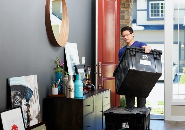 A man packing for a move