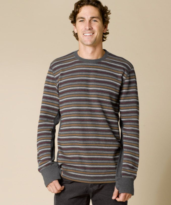 A man in a brown, striped sweater. 