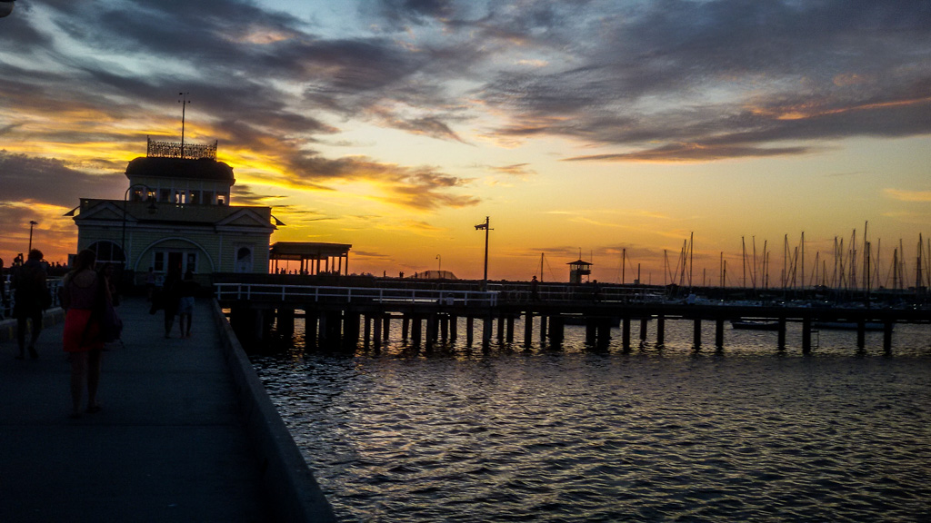 St Kilda Pier at sunset with penguins