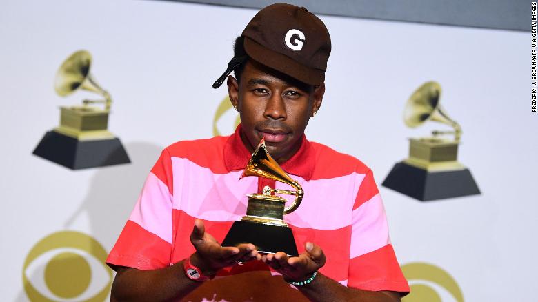 Tyler, the Creator poses in the press room with the award for Best Rap Album for &quot;Igor&quot; during the 62nd Annual Grammy Awards in Los Angeles on January 26, 2020.