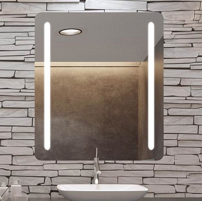 a mirror with lighting around the edges in a luxury bathroom