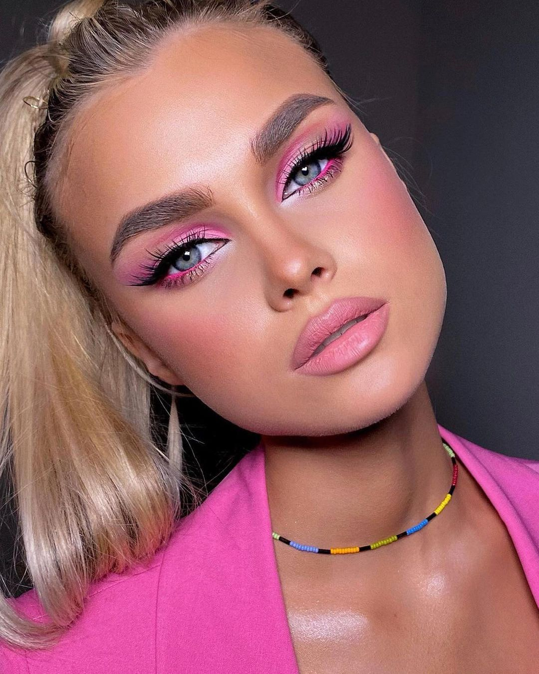 A vibrant pink eyeliner will bring out the blue and green tones in grey eyes.