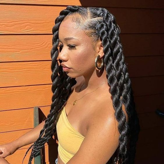 lady in the sun wearing Senegalese twists