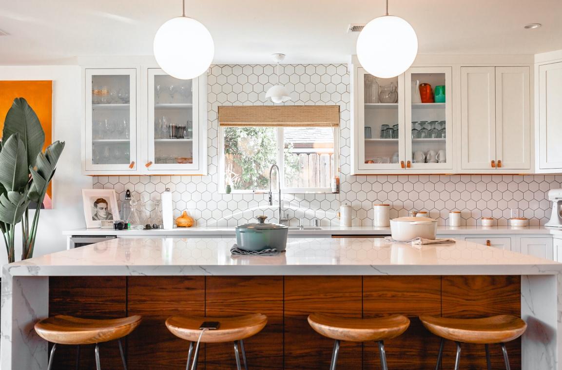 Kitchen with white countertop and overhead lights