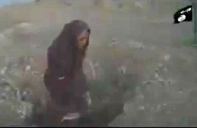 Sickening: The woman is seen pleading for her life before being stoned to death by men - including her father