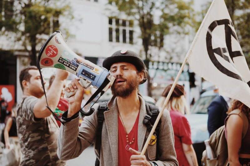 A rebel with a flag and speakerphone