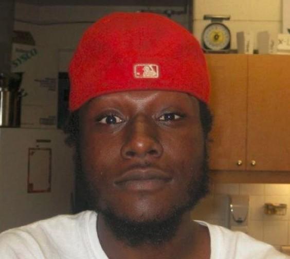 A person wearing a red hat
Description automatically generated