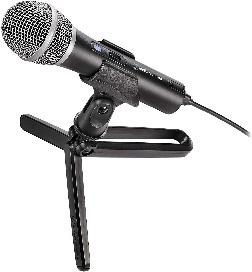 Une image contenant microphone, noir
Description générée automatiquement