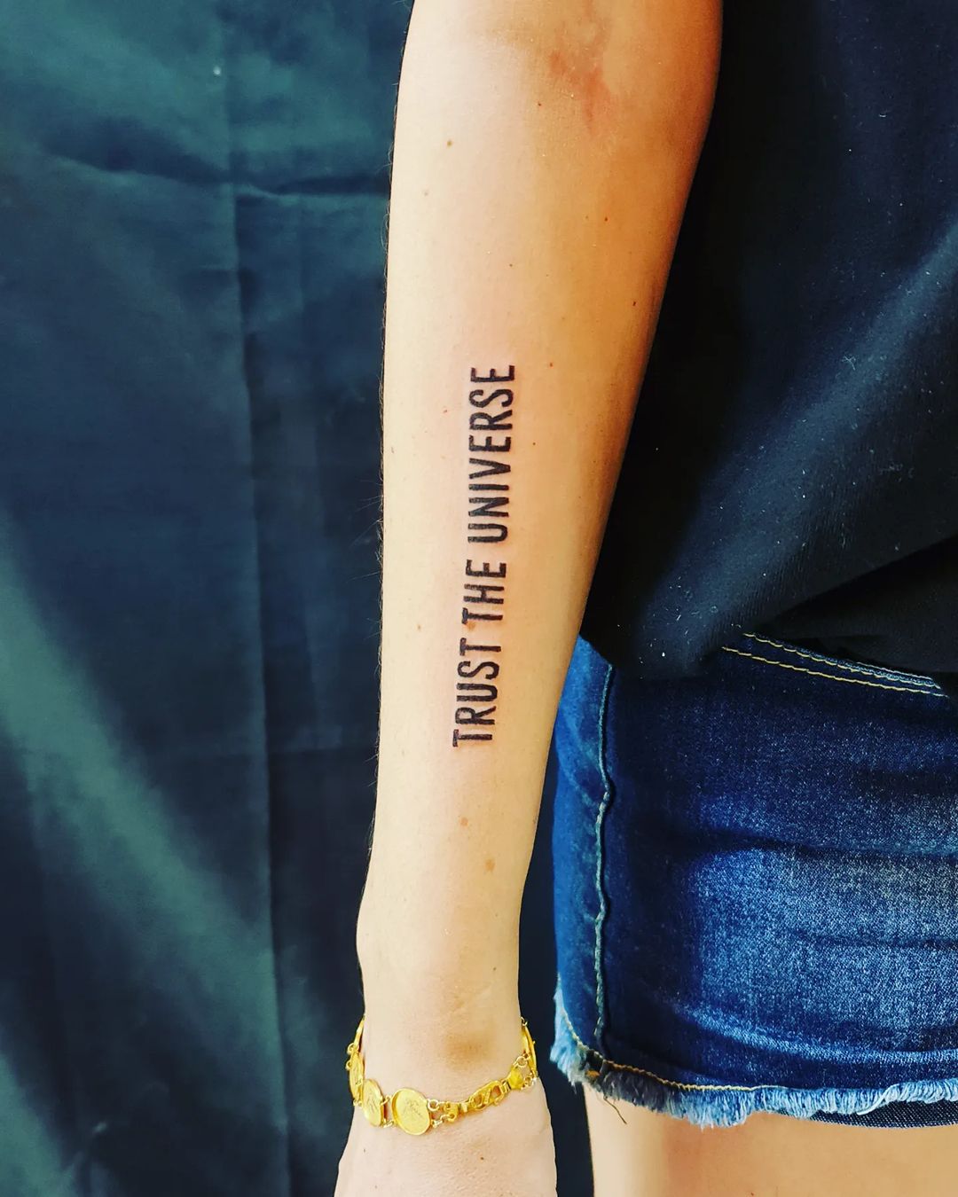 Trust The Universe Wrist Tattoo