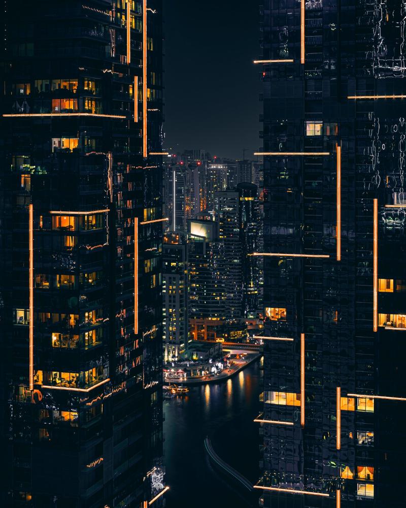 A futuristic city at night.