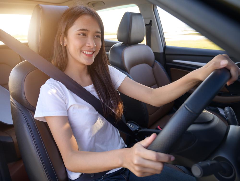 A person sitting in a car  Description automatically generated with medium confidence