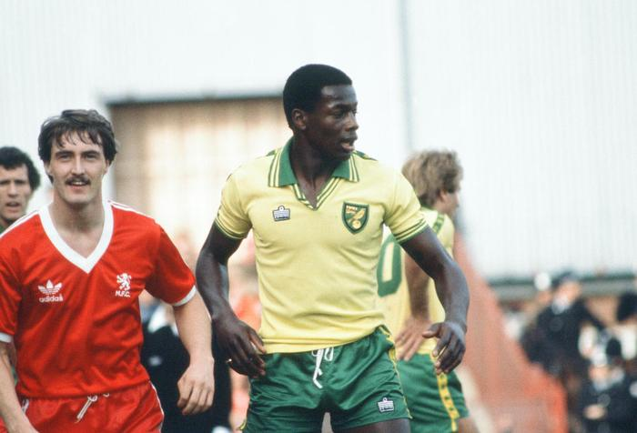 Justin playing for Norwich against Liverpool