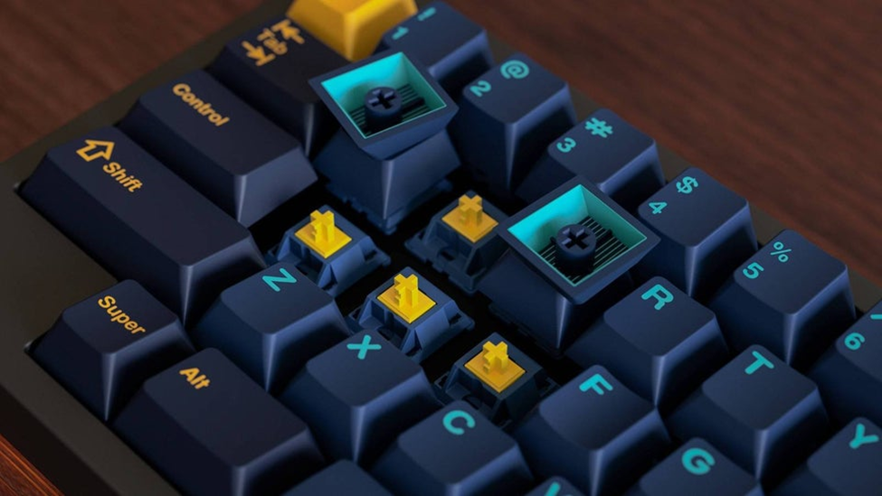 Once you have the correct tools use the keycap puller to remove the keycaps to get to the switches.