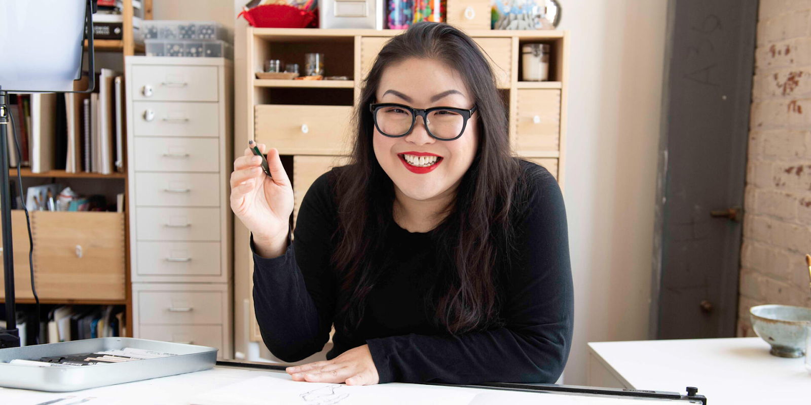 Zoe Hong at her desk