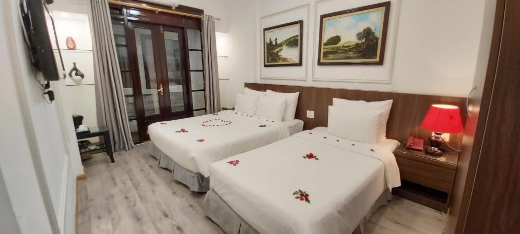 Phòng nghỉ tại khách sạn Hanoi Endless với phong cách thiết kế đậm nét phương Đông truyền thống, không chỉ sang trọng mà vô cùng ấm cúng