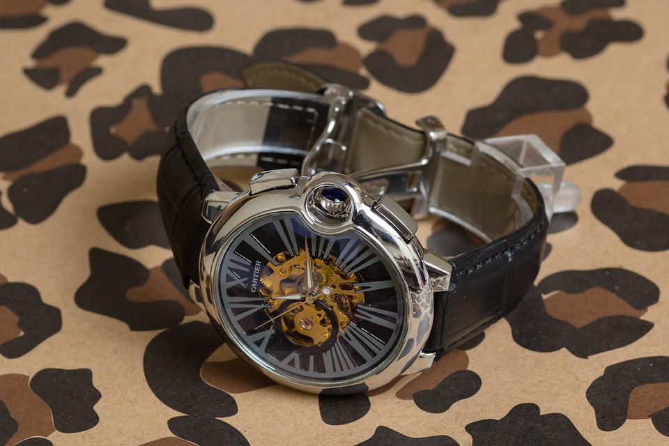 Men's Cartier watch on leopard background