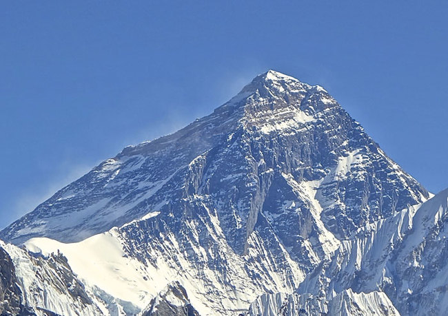 6) China and Nepal - The summit of the highest mountain in the world, Mt. Everest, marks the border between the small landlocked sovereign state of Nepal and China.