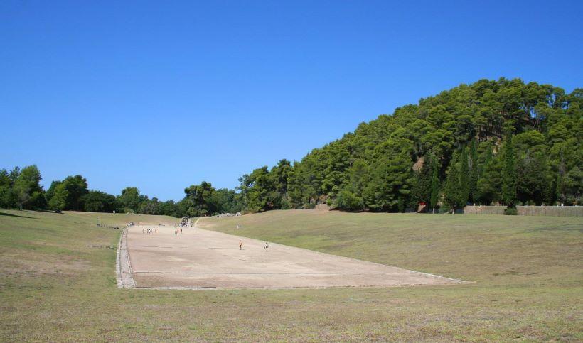 https://www.discovergreece.com/~/media/images/highlight-large-images/az/a/ancient-olympia/the-ancient-stadium-of-olympia.ashx?w=820&h=483&crop=1