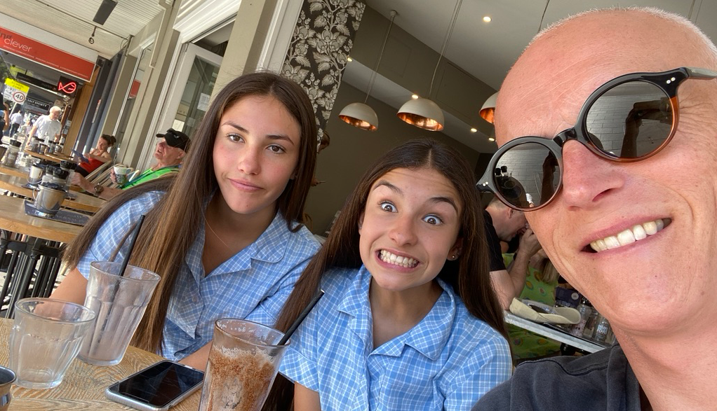 Guy Ligertwood has breakfast with his daughters before school.