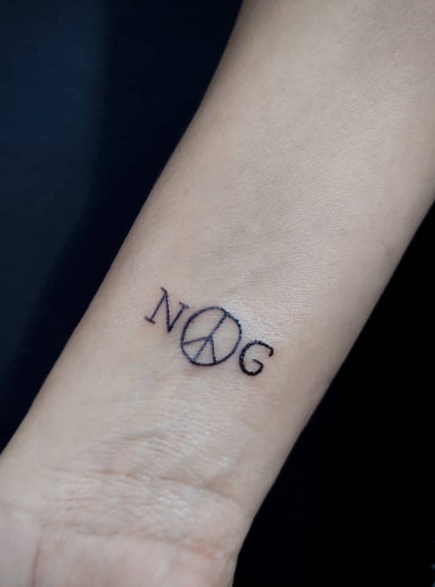 Tiny Peace Tattoo Design
