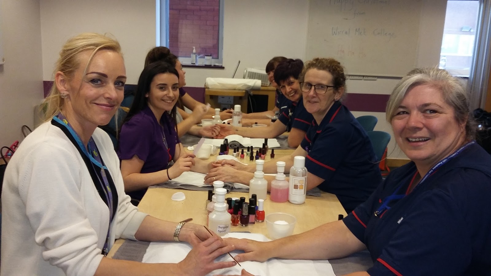 Wirral Met Beauty Therapy and Complimentary Therapy students pampering Arrowe Park nurses for Stress Management Pamper Day