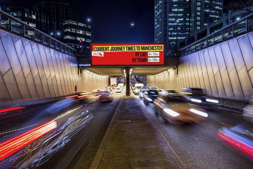 Digital billboards in prominent places like this one in a heavy traffic area benefit from showing up to date traffic information.