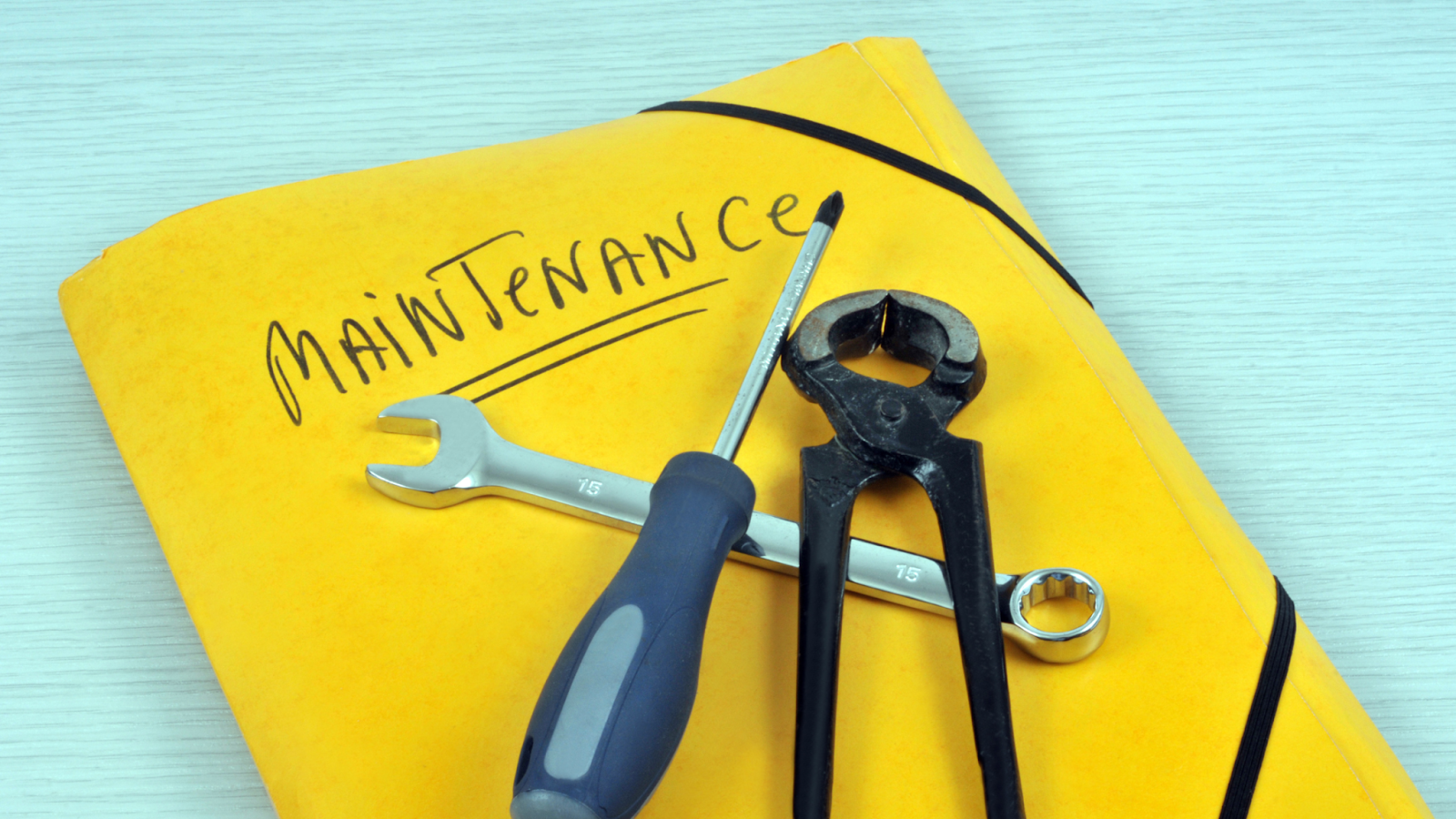 Tools placed on top of maintenance book