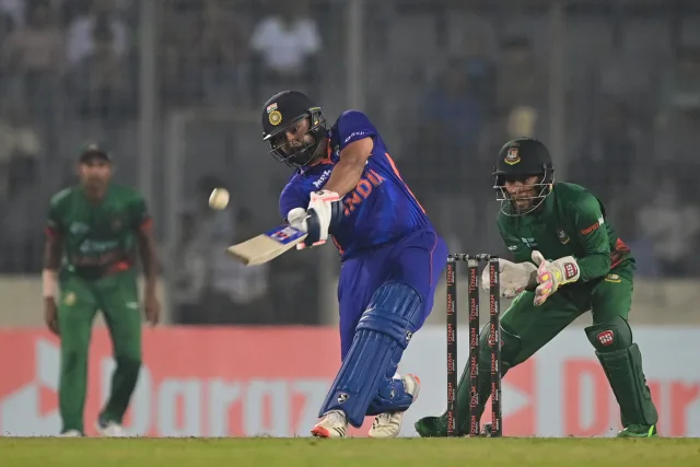 An injured Rohit Sharma smacked 51 off 28 from No. 9