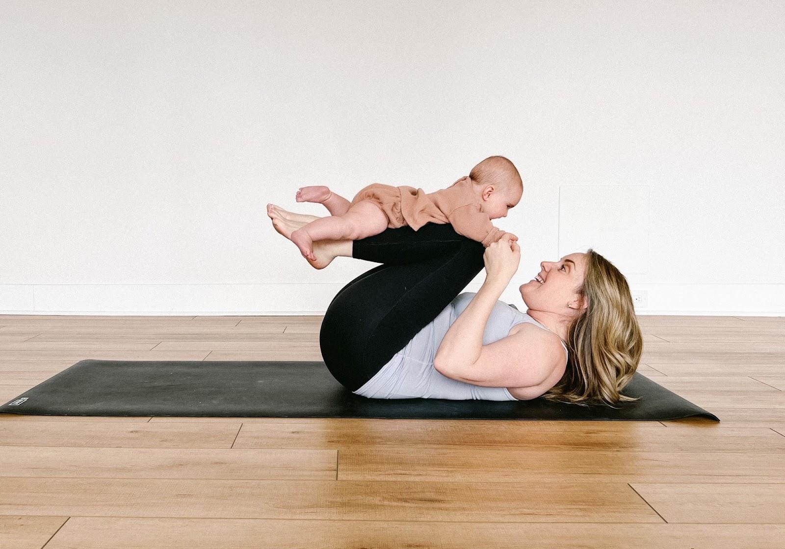 Yoga with baby - Reclined boat pose 2 - Kate Lombardo