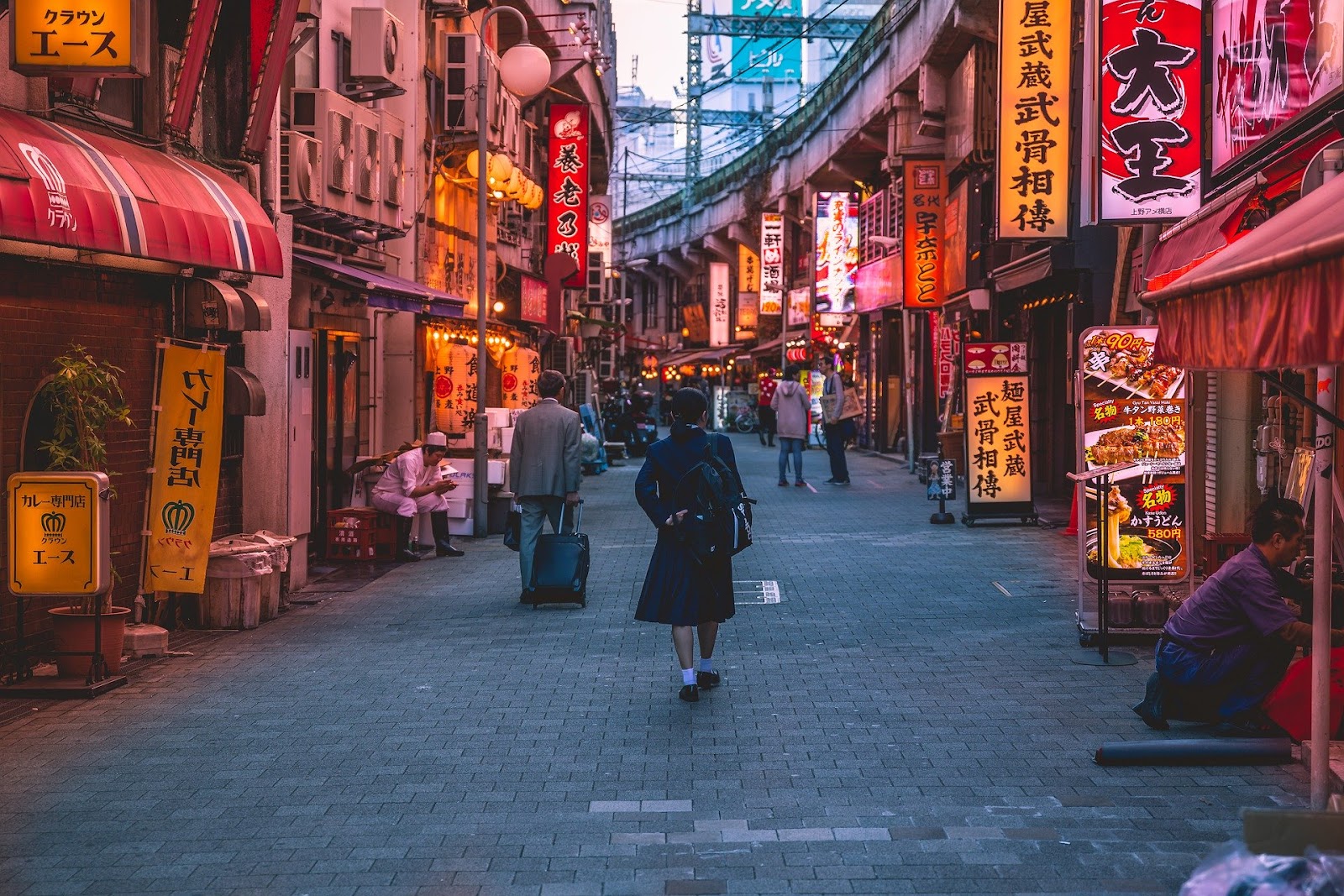 Female traveler walking into street