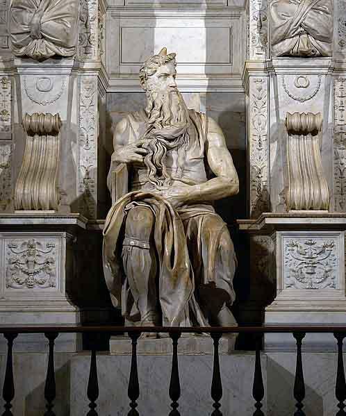 Famous (larger than life) sculpture of Moses (sitting between two pillars) crafted by Michelangelo, roughly 1513-1515, located in San Pietro in Vincoli, Rome.