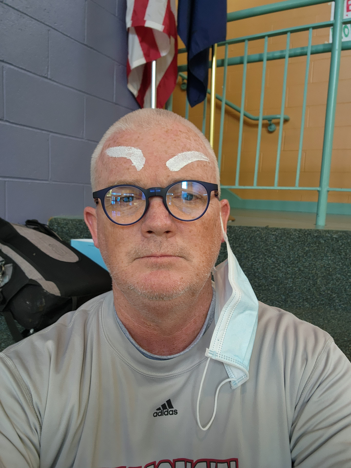Principal Boyle with grey paint on his forehead