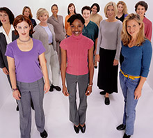 Large group of women standing side by side.