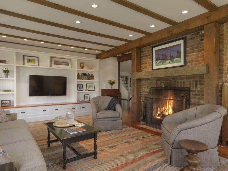 Minimalistic Beam Ceiling with Timber-Framed Fireplace