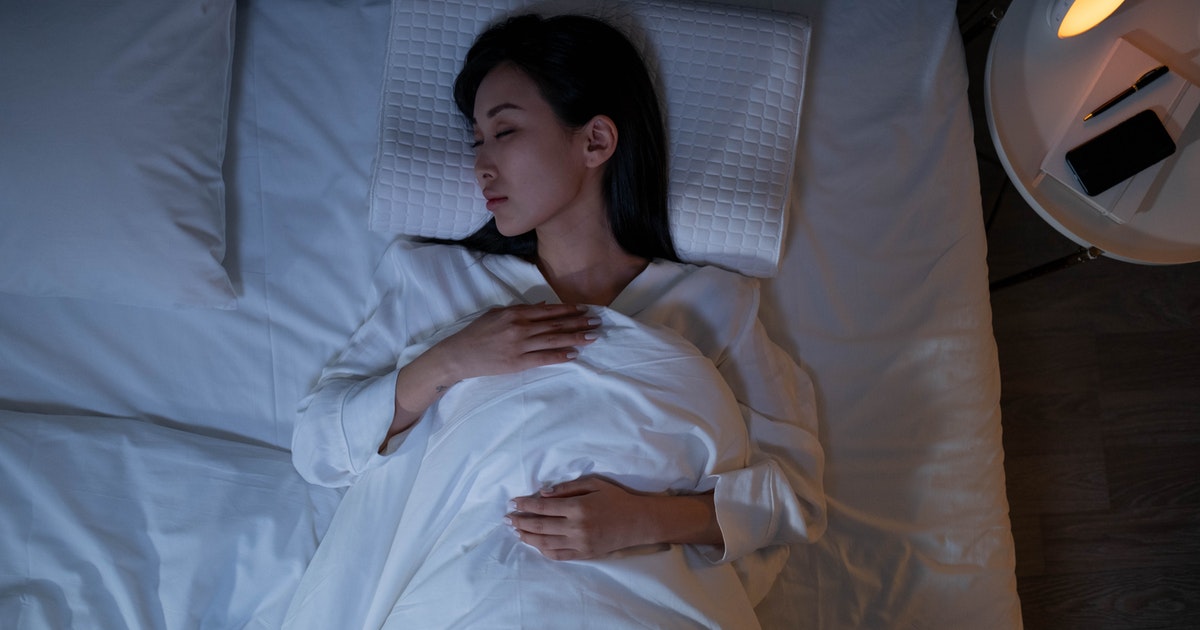 Asian woman sleeping through the night
