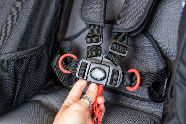 Safety harness design is an important consideration when purchasing the best walking stroller for your baby. - Best Walking Stroller Review | Baby Journey